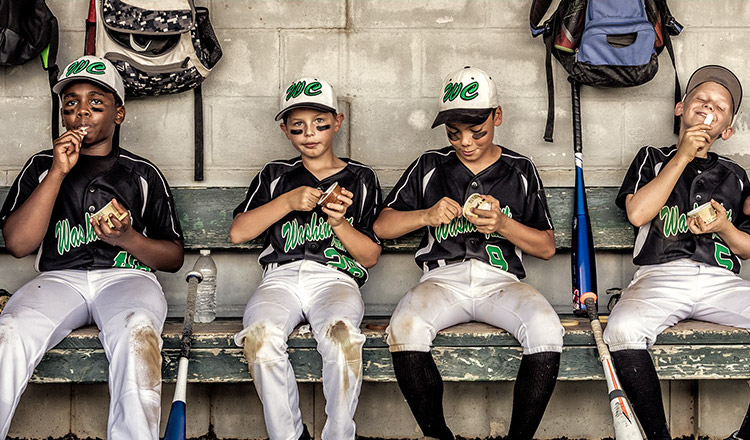 A team celebrating a win with Blue Bell frozen snacks