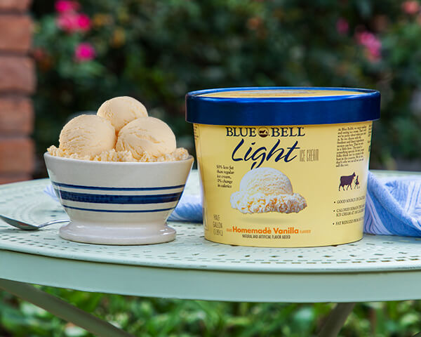 Blue Bell Homemade Vanilla Light in half gallon with bowl