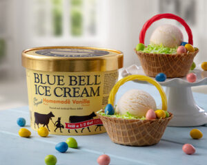 Blue Bell Easter Basket recipe made with a waffle cone bowl, green died coconut, twisted rope candy, and egg shaped candies.