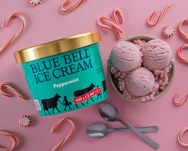 Blue Bell Peppermint Ice Cream in bowl with half gallon